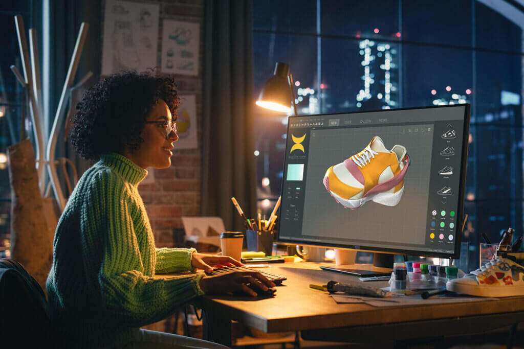 woman does design work on the pc