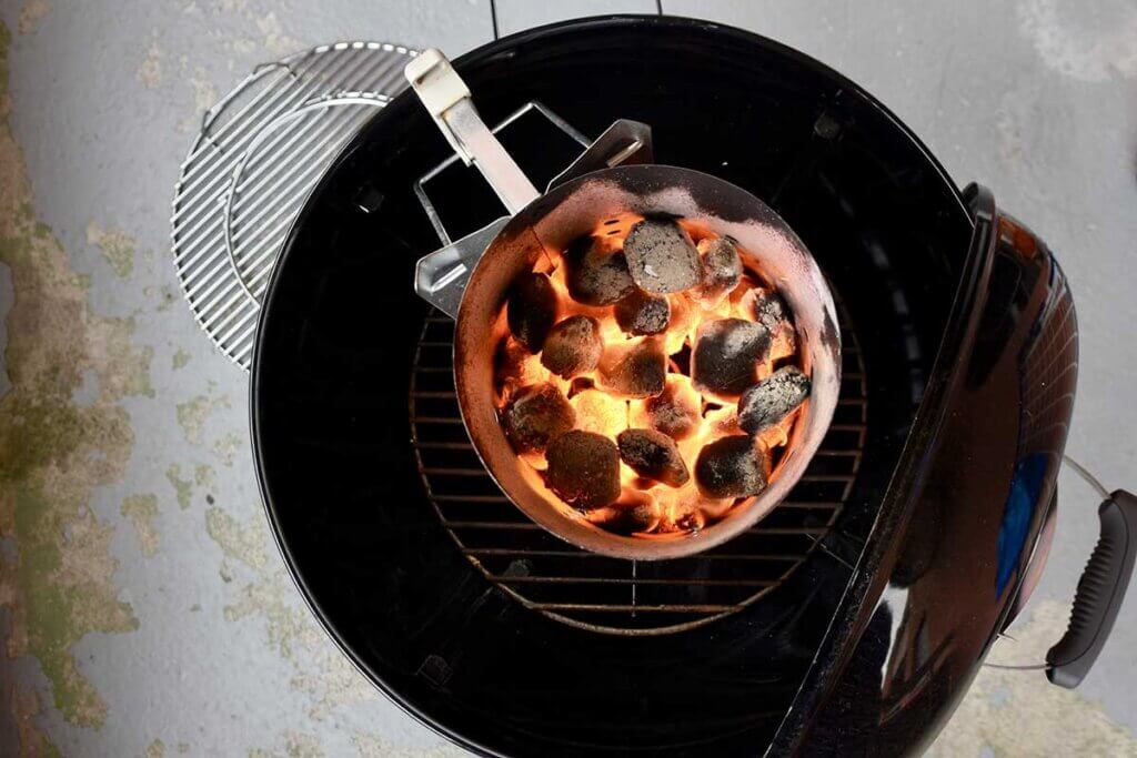 top view of kettle barbecue with fuel chimney