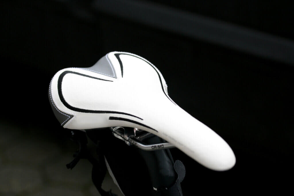 white road bike saddle with its long shape