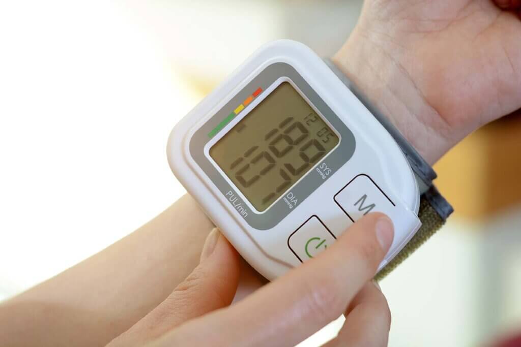 blood pressure monitor close up wrist with measuring device