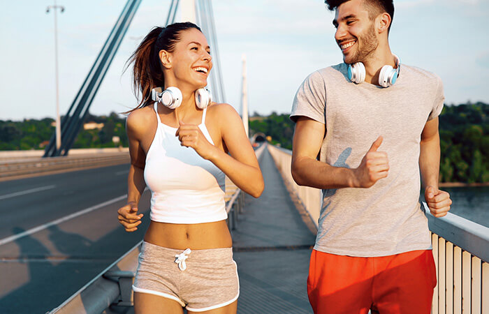 headphones on jogging