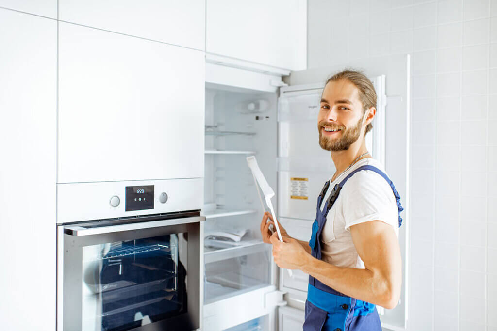 Craftsman assembling kitchen