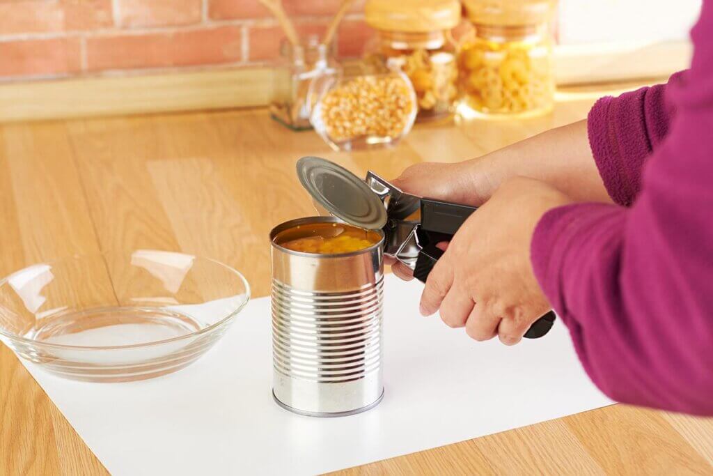 opening a can of fruit