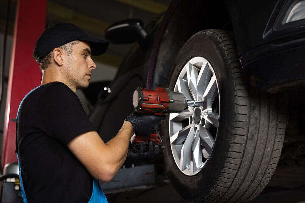 Impact wrench changing a tire