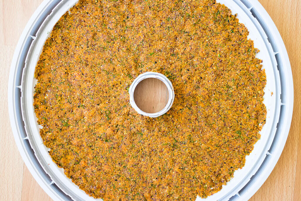 Dehydrator for vegetable flakes