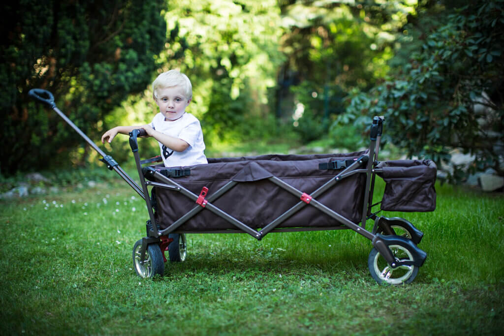 Folding wagon with child