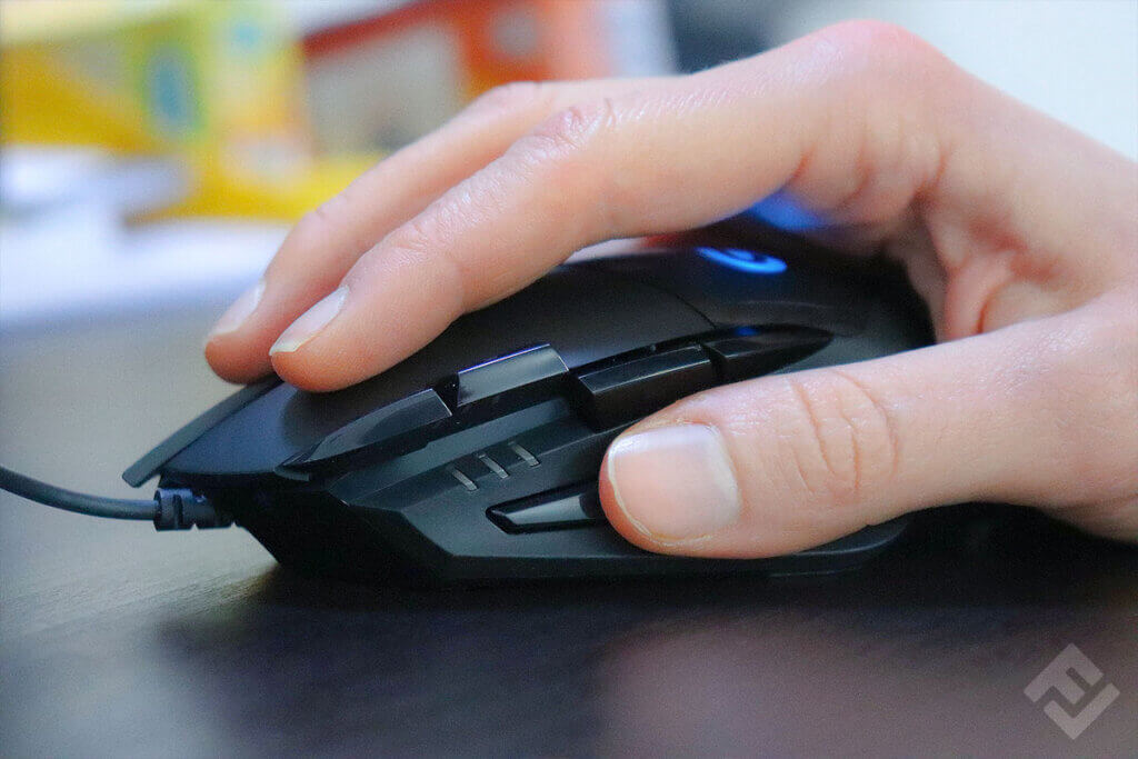 Right hand on Logitech G402 Hyperion Fury.