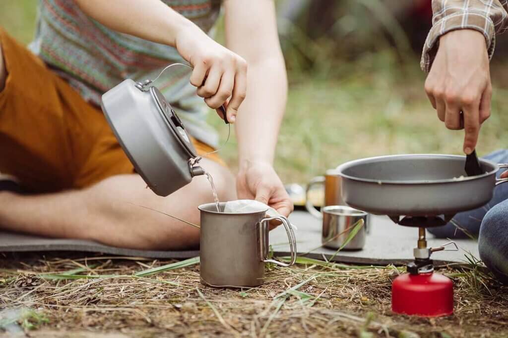 Campers prepare tea and food