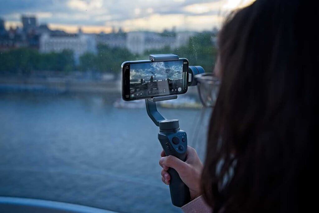 Woman holding gimbal