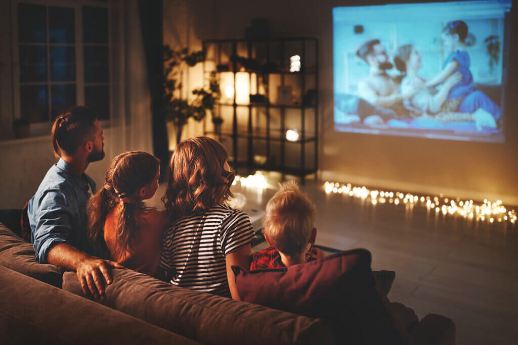 family using a projector