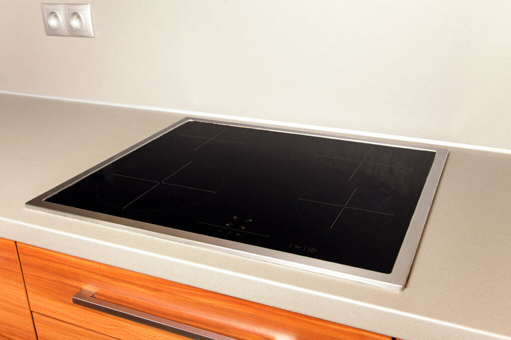 Induction cooktop with surface induction