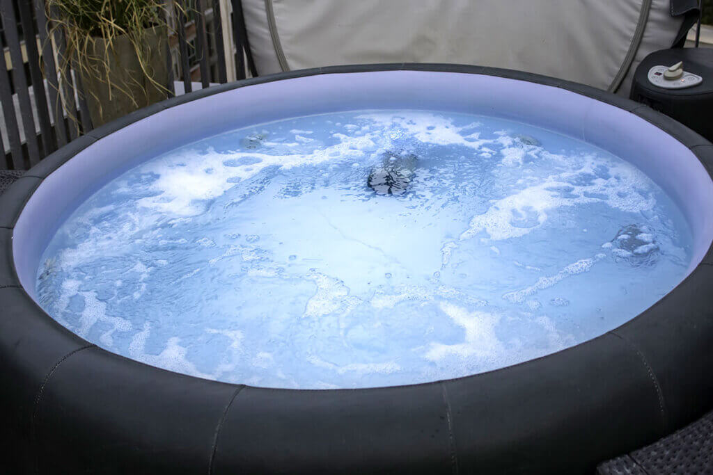 hot tub in a yard