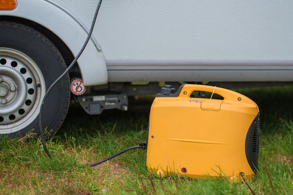 Generator standing in front of caravan