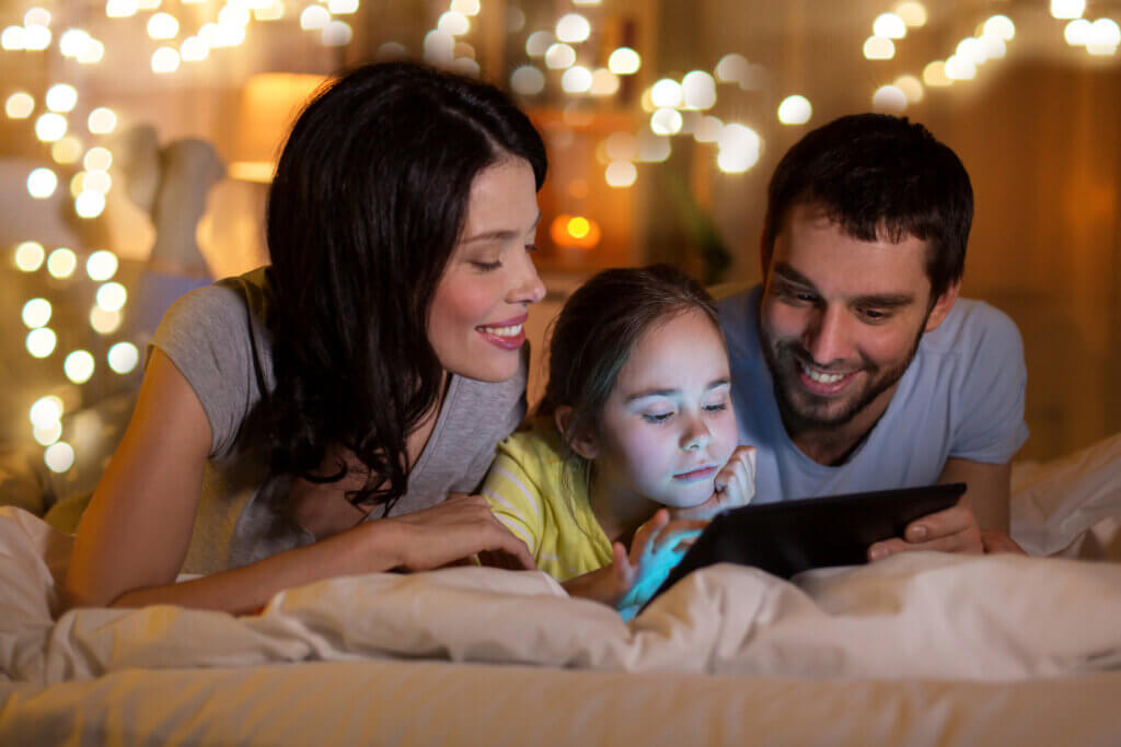 Family playing together with tablet