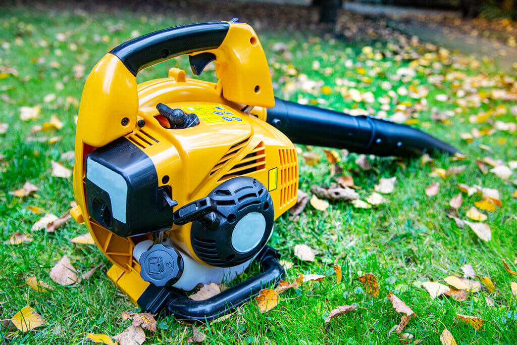 yellow leaf blower on lawn