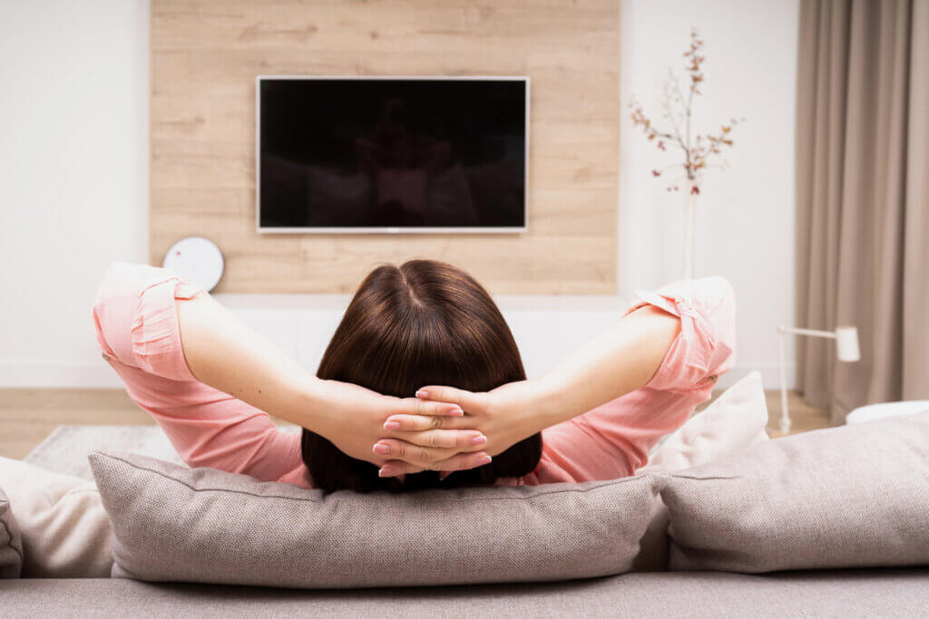  Woman on couch in front of TV