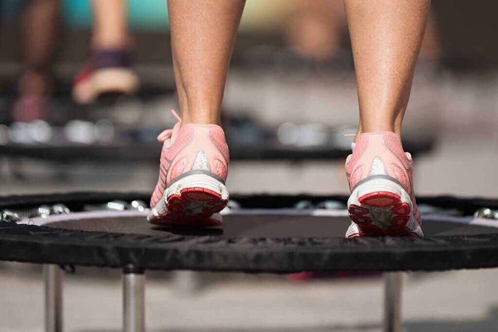 Pink shoes on mini trampoline