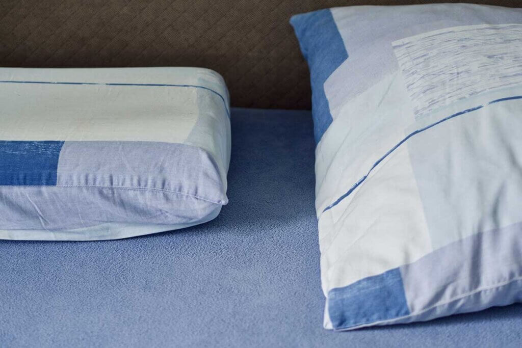  small and large pillows next to each other