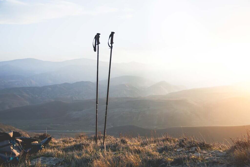 nordic walking poles on mountain in nature
