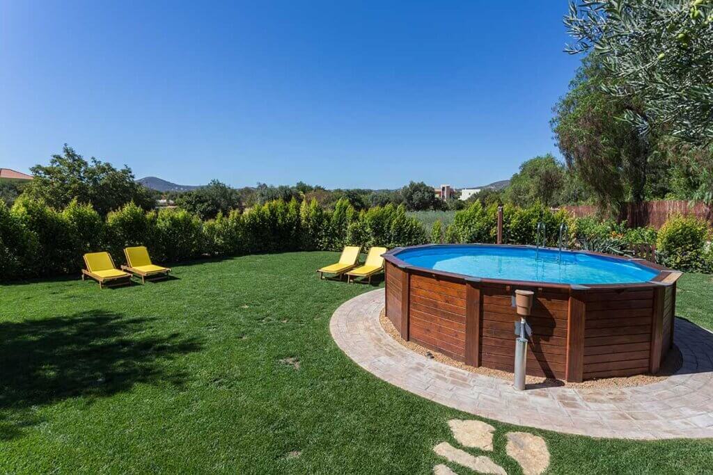wood pool in garden with view