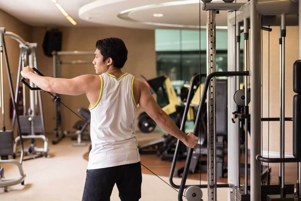 man exercising with power station