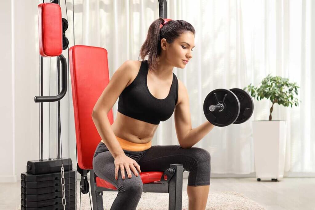 woman training at home on power station