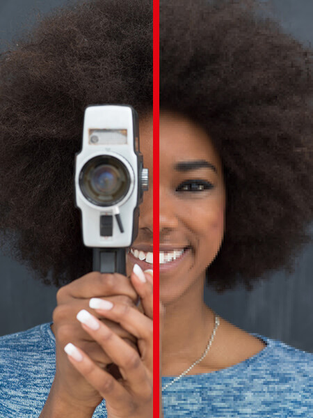 woman holding film camera