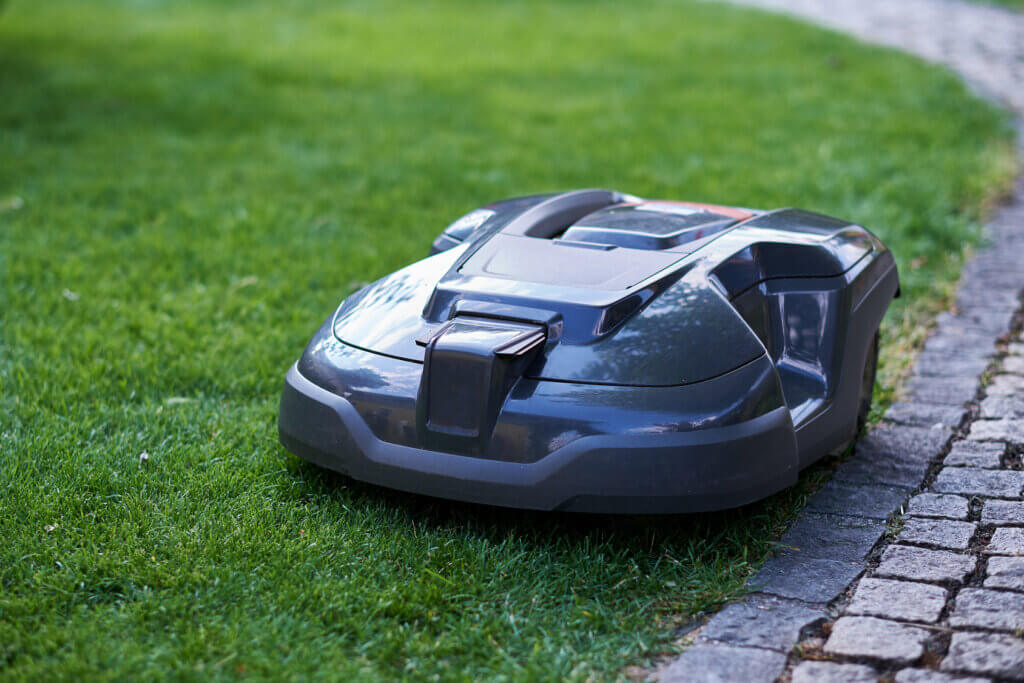 Robotic lawnmower at the lawn edge