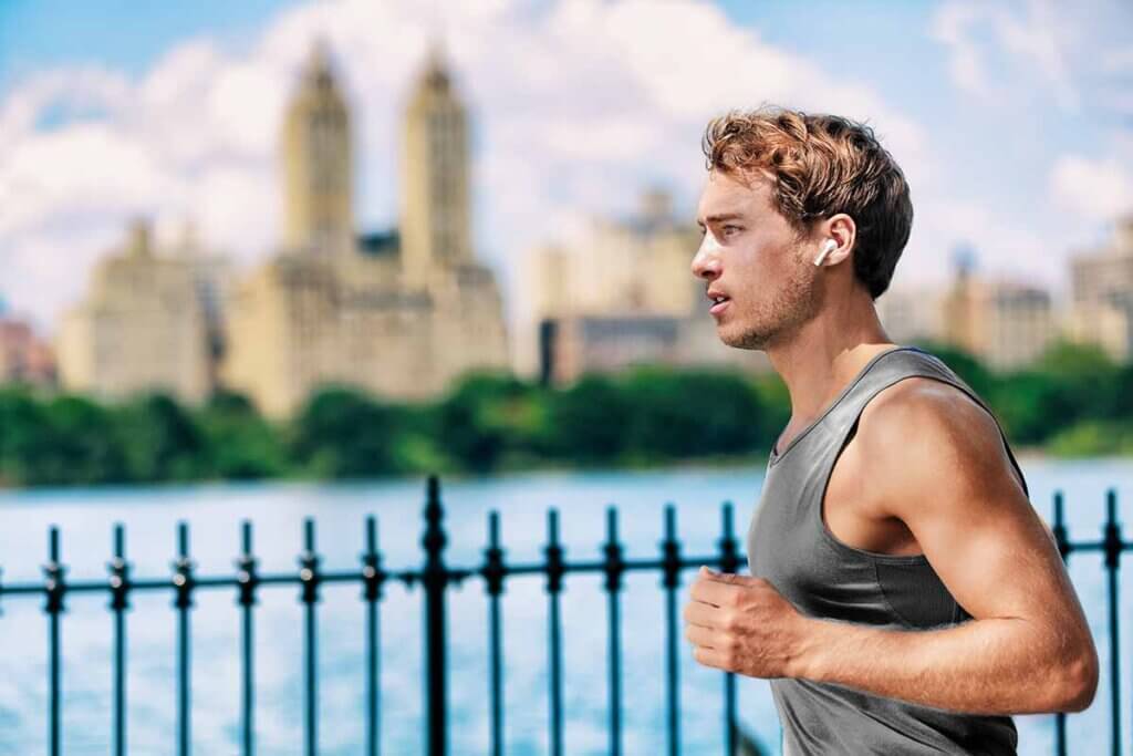 man jogging with headphones