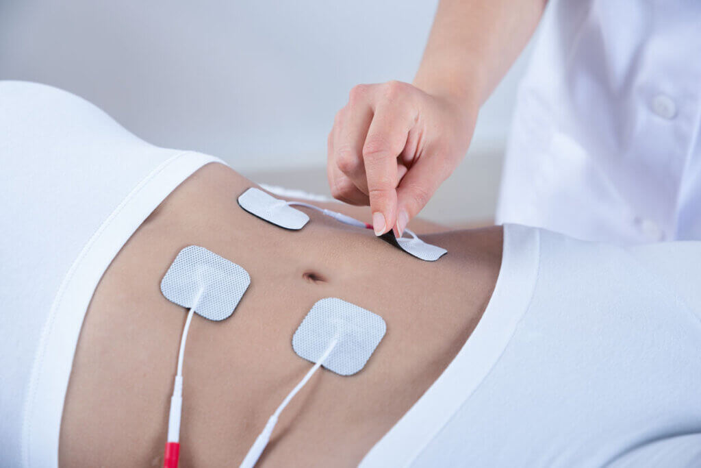 Electrodes are attached to the abdomen