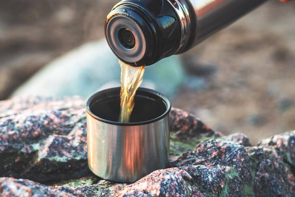 close up pouring coffee