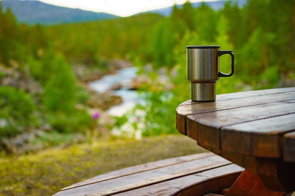 travel mug on table