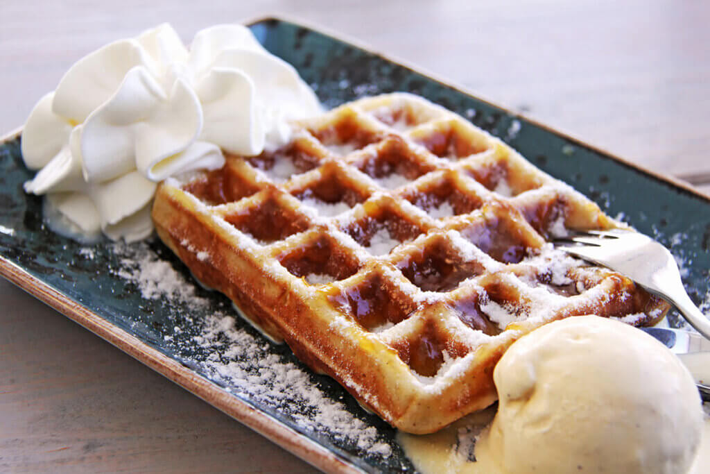 Waffle with cream and ice cream