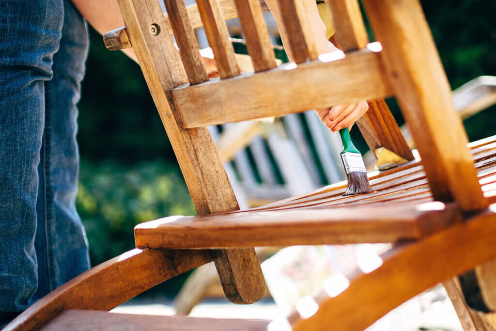 Wooden furniture on the terrace is glazed